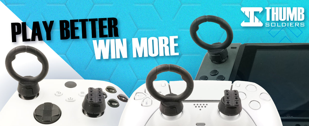 White game controllers with black thumb-stick style grips and a black joystick, shown against a bright blue graphic background with the text 'PLAY BETTER WIN MORE' and the Thumb Soldiers logo.