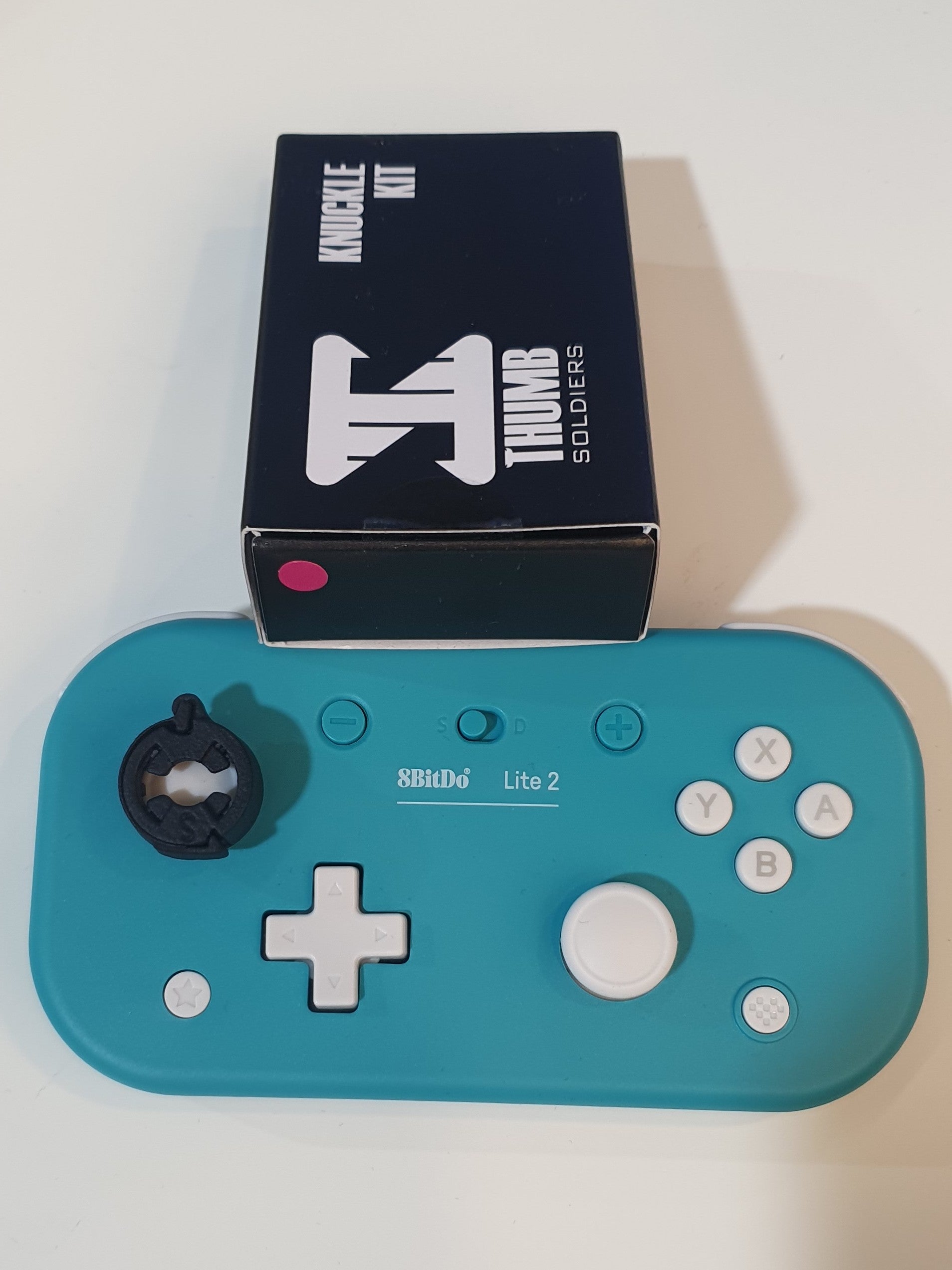 S Knuckle on 8BitDo Lite 2 for custom thumbstick toppers