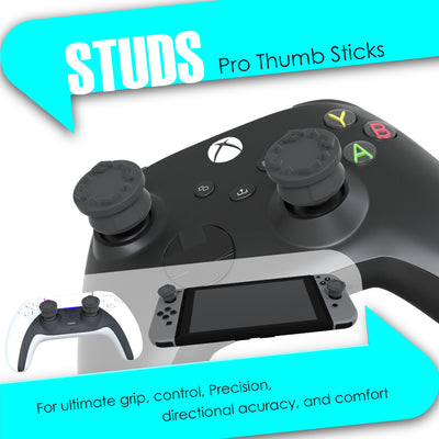 The image shows a set of black precision thumbsticks, also known as Thumb Studs, designed for use with gaming controllers. The thumbsticks have a textured top for improved grip and are displayed on a promotional graphic with text highlighting their features, such as ultimate grip, control, precision, directional accuracy, and comfort.
