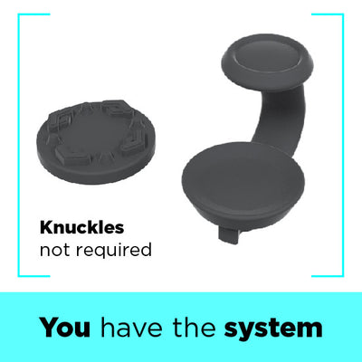 Black joystick attachments on a white background with text 'you have the system'